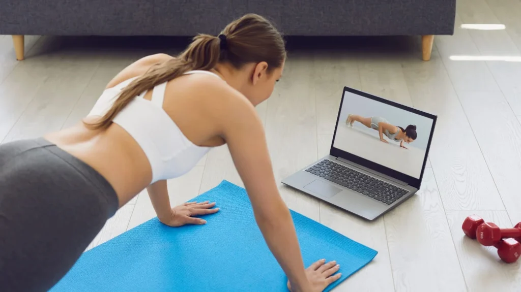 Online fitness training session helping a person achieve long-term transformation in strength